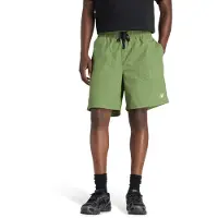 New Balance Calças de desporto 'Castlefield Woven Short 7"' verde / verde relva